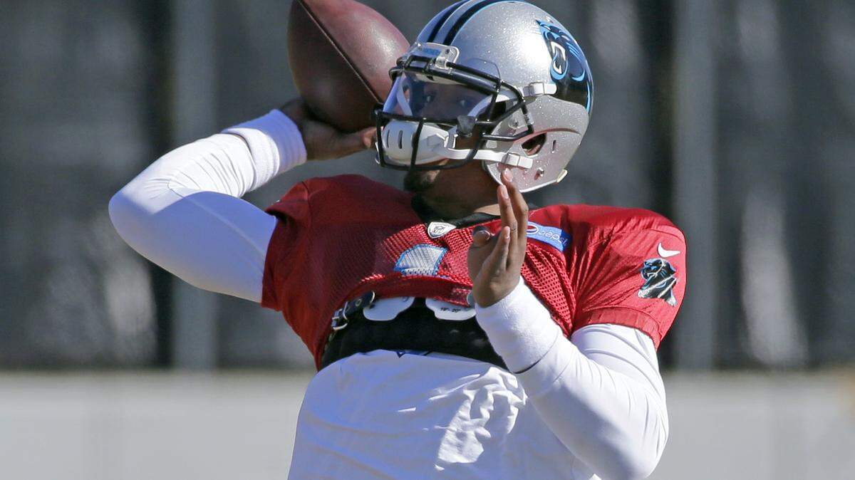 Carolina Panthers' Cam Newton throws a pass during NFL football practice, Friday, Jan. 29, 2016, in Charlotte, N.C. (AP Photo/Chuck Burton)