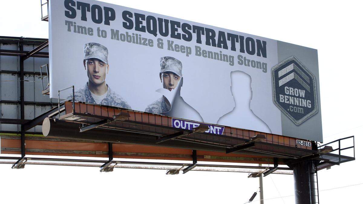 Mike Haskey/mhaskey@ledger-enquirer.comThis billboard encourages people to help in efforts to stop sequestration. Army budgets have been cut and 2,600 of 3,600 soldiers are to be cut from the 3rd Armored Brigade Combat Team at Kelley Hill.