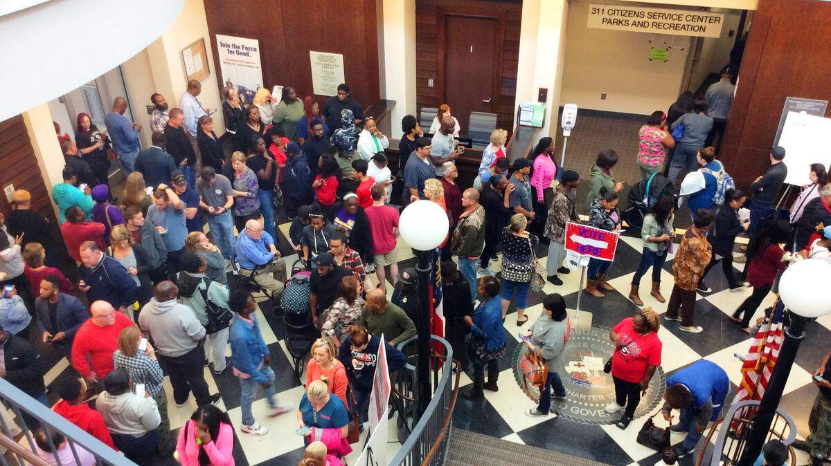 Voters line up Friday in the City Service Center on the last day of early voting in Columbus.