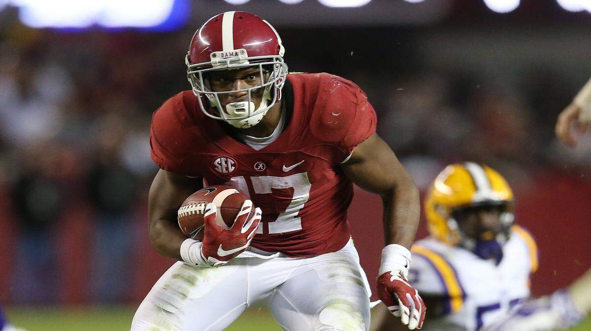 Alabama running back Kenyan Drake (17) runs against LSU in the second half of an NCAA college football game Saturday, Nov. 7, 2015, in Tuscaloosa , Ala. (AP Photo/John Bazemore)