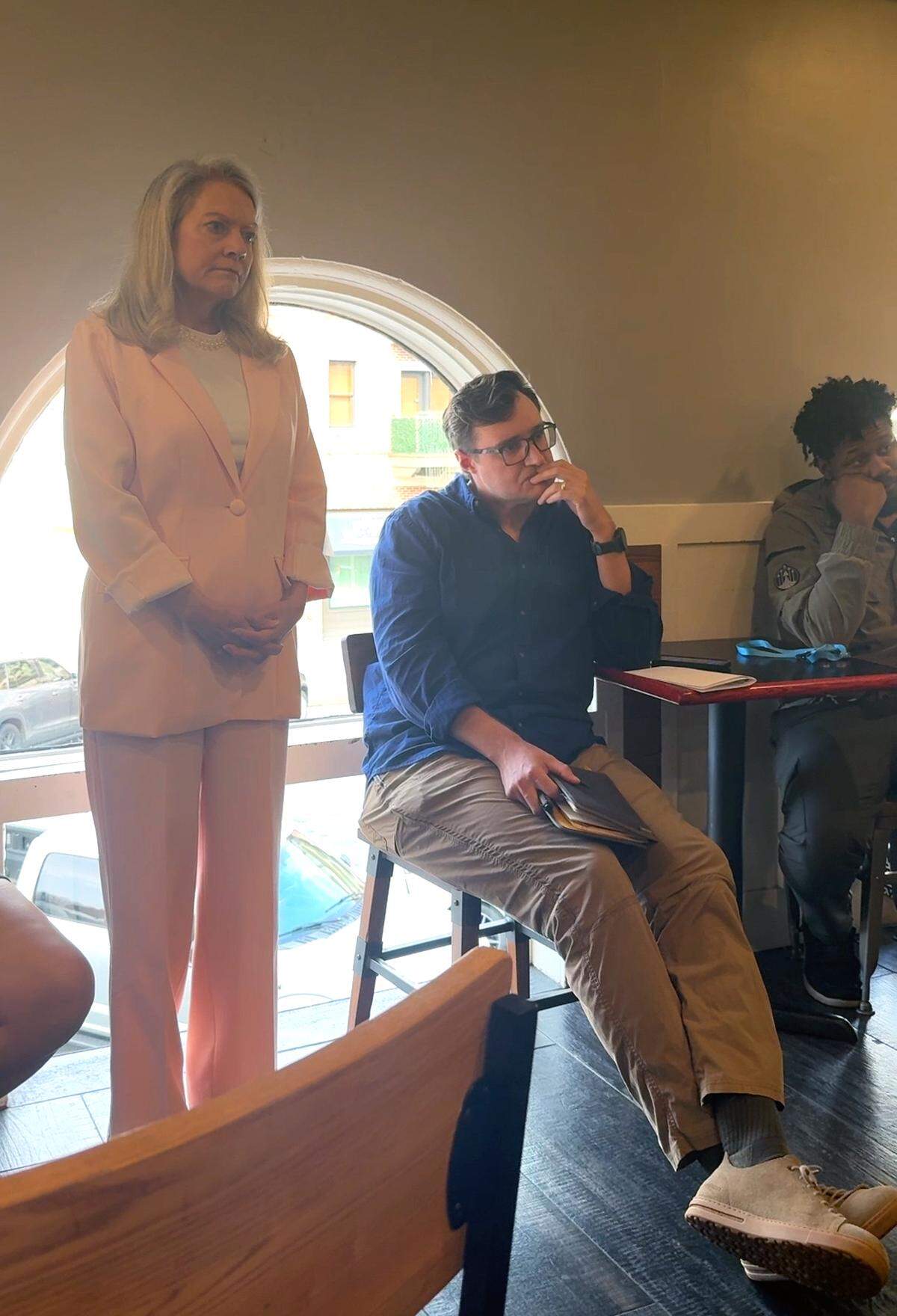 Missy Kendrick, at left, president and CEO of Choose Columbus speaks to Columbus residents gathered Feb. 20, 2026, at Iron Bank Coffee Company in Columbus to discuss economic development news in the Chattahoochee Valley. Choose Columbus is hosting public meetings to hear residents’ concerns and questions. The event series, called Percolate and Elevate, invites Columbus residents to speak with Kendrick and other local officials about economic development projects.