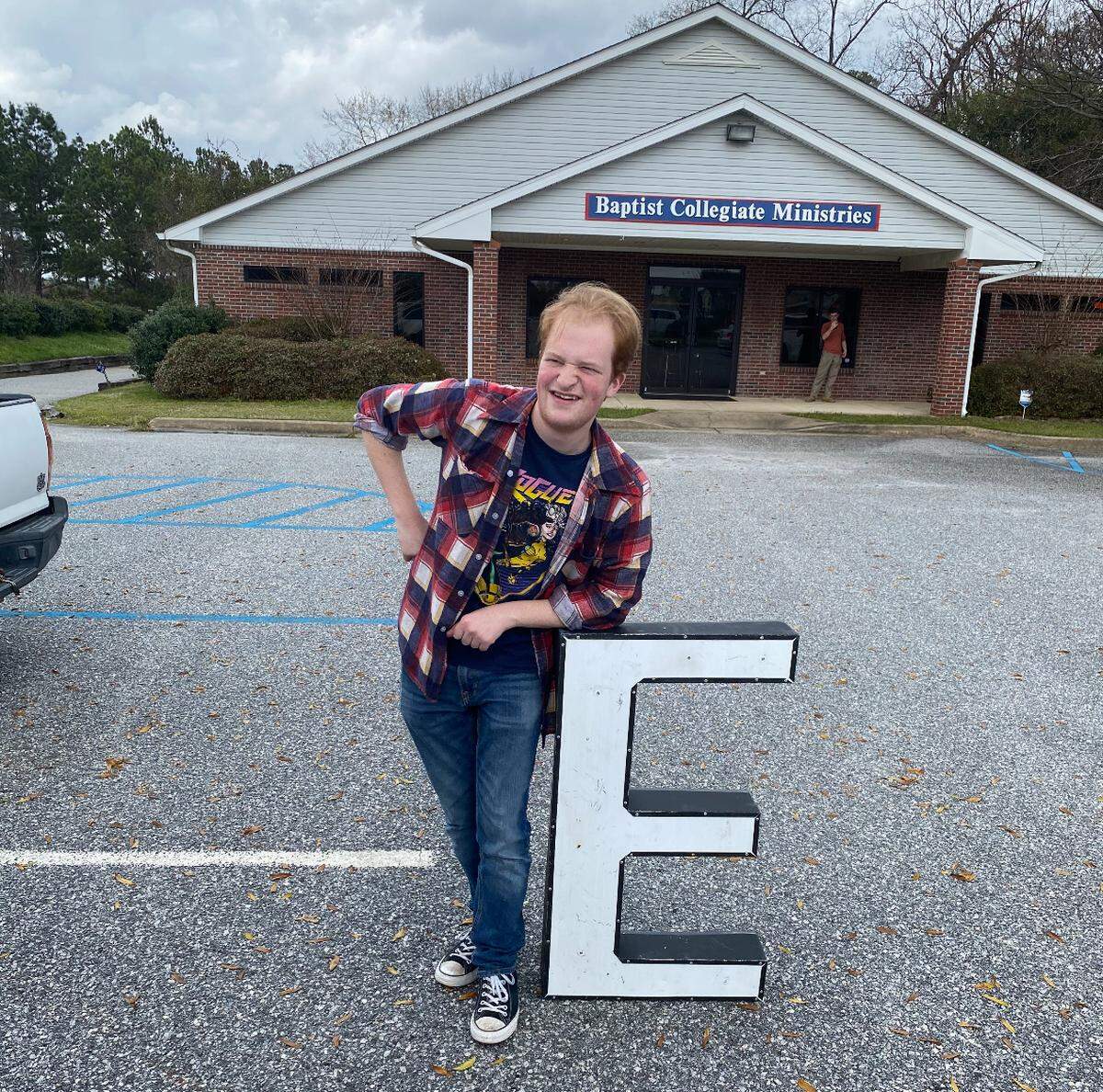 Harris County High School and Columbus State University graduate Grant Martin poses in front of the Baptist Collegiate Ministry at CSU. His father, Phil, said he “practically lived” there.