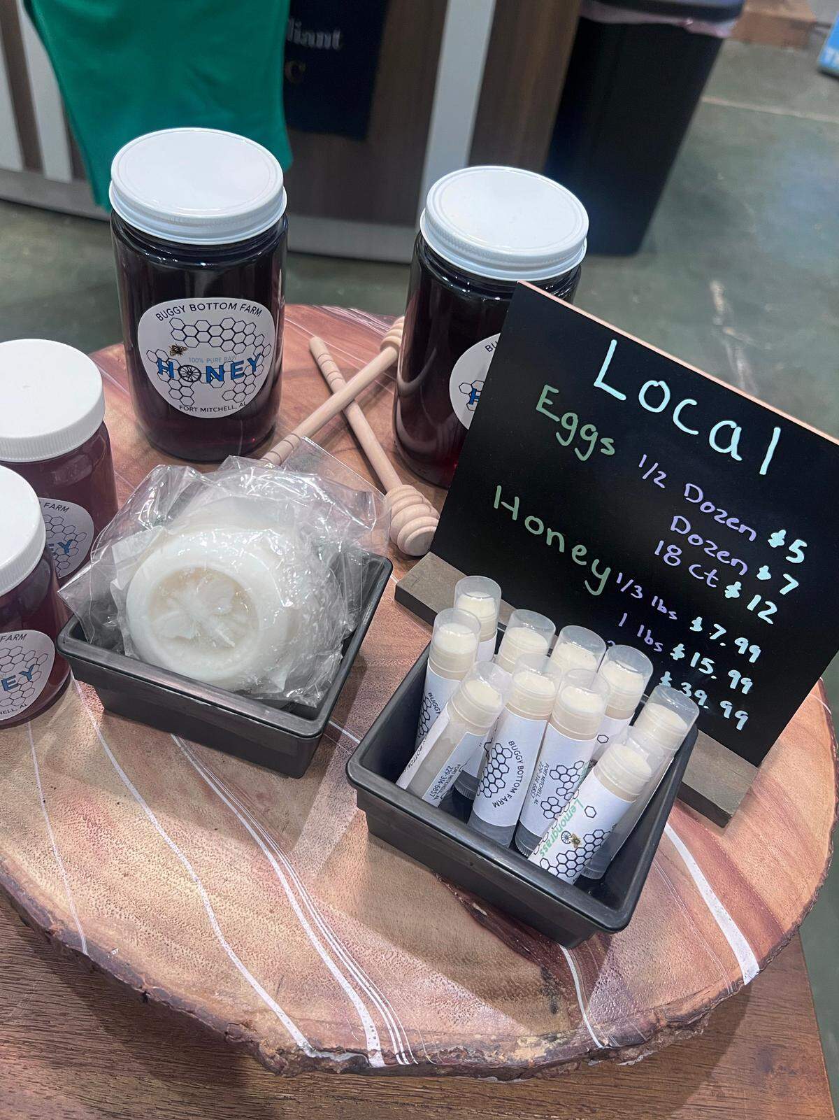 A variety of local products like local eggs and honey are for sale inside Highside Market in Columbus, Georgia.