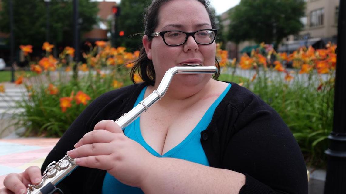 A special mouthpiece crafted in the Netherlands allows Leslie Thompson, 27, to play the flute after she suffered disabling injuries from a 2012 auto accident.