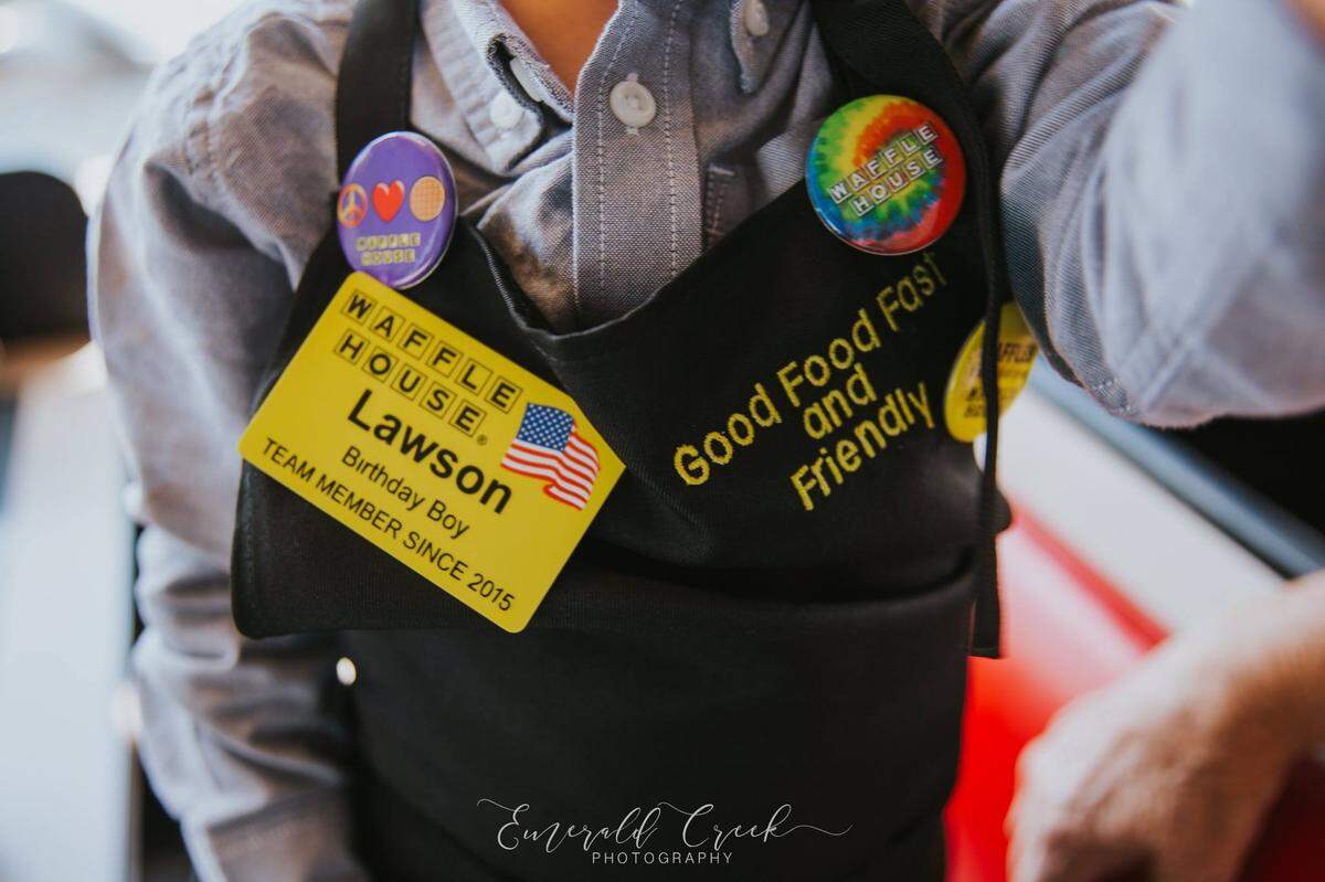 Lawson was decked out in an apron, special buttons and his own nametag.