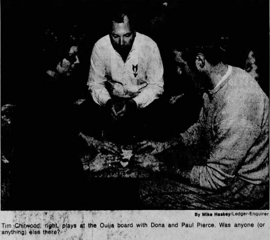 L-R Dona Pierce, Paul Pierce, Tim Chitwood attempt to conjure spirits at the Springer Opera House