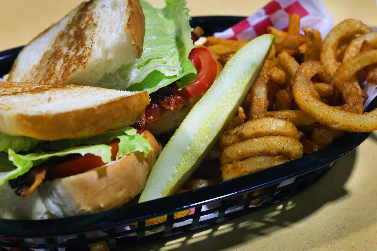 Ledger-Enquirer photographer Mike Haskey ordered the BLT sandwich with a side order of curly fries at Midtown Cafe & Bakery in Columbus on July 25, 2025.
