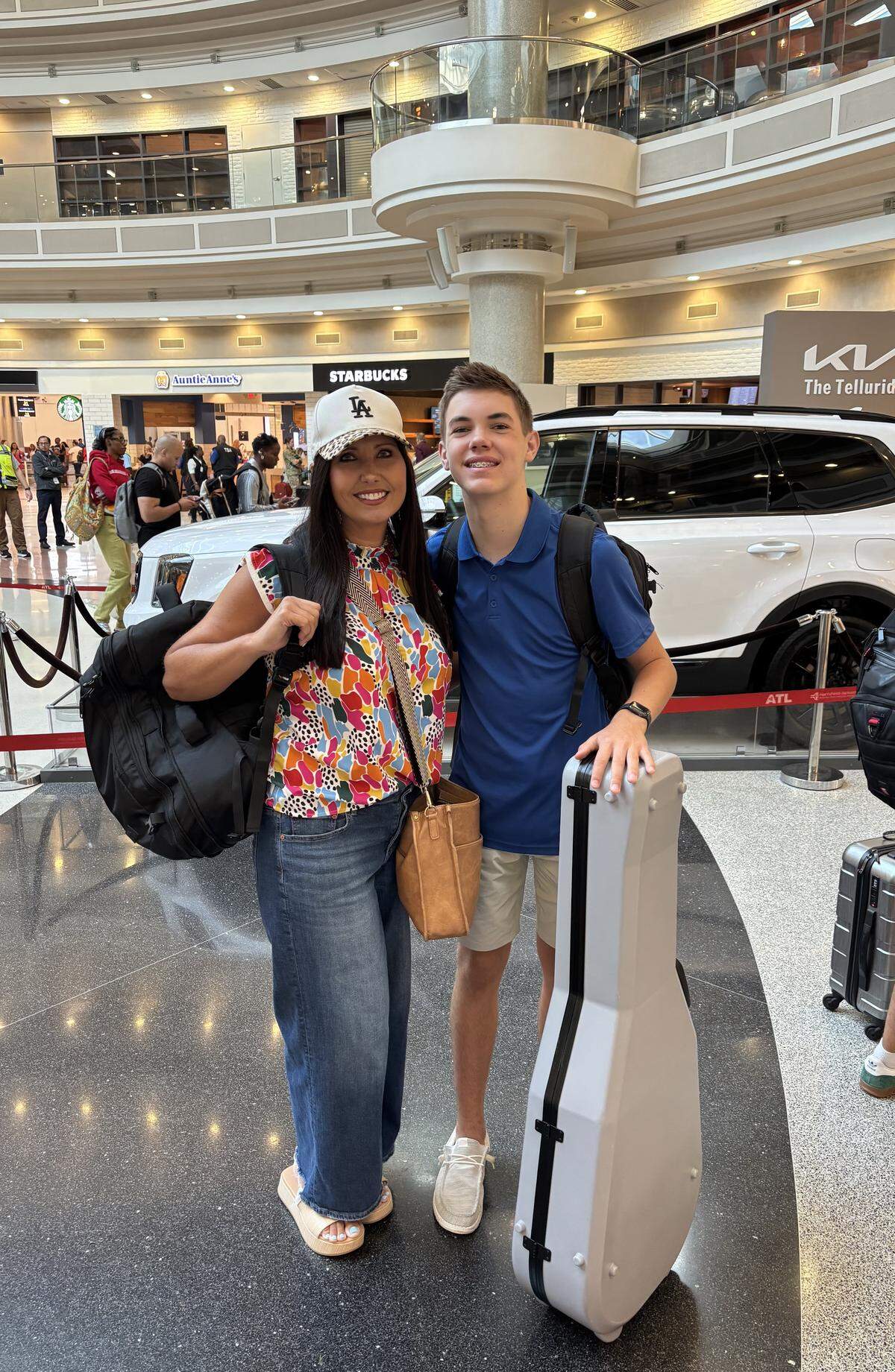 AJ Robinson of Cataula in Harris County, a ninth-grader at Calvary Christian School in Columbus, poses with his mother, Shannon, during their trip to Universal Studios in Hollywood, California, where he performed in the Feb. 23, 2026, episode of the singing competition TV show “The Voice” on NBC.