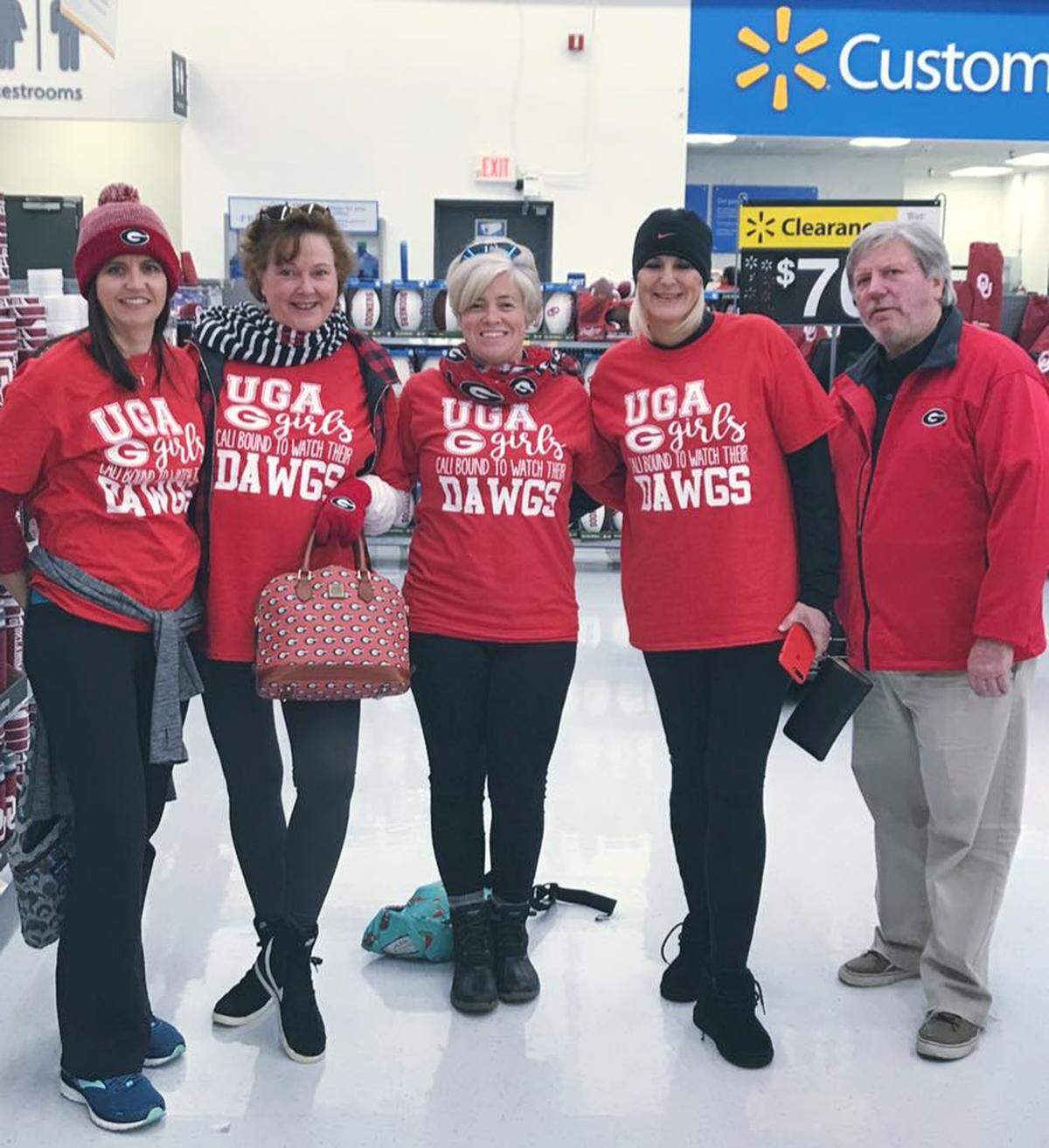 The group, decked out in UGAa gear at a Walmart.