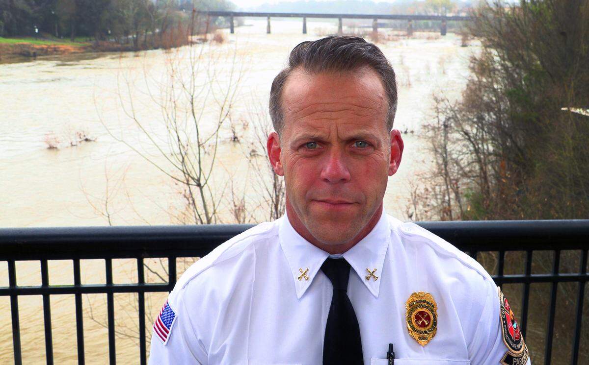 John Shull, fire marshal/division chief at Columbus Fire & EMS, talks about new signs placed on bridges over the Chattahoochee River that denote river safety zones.