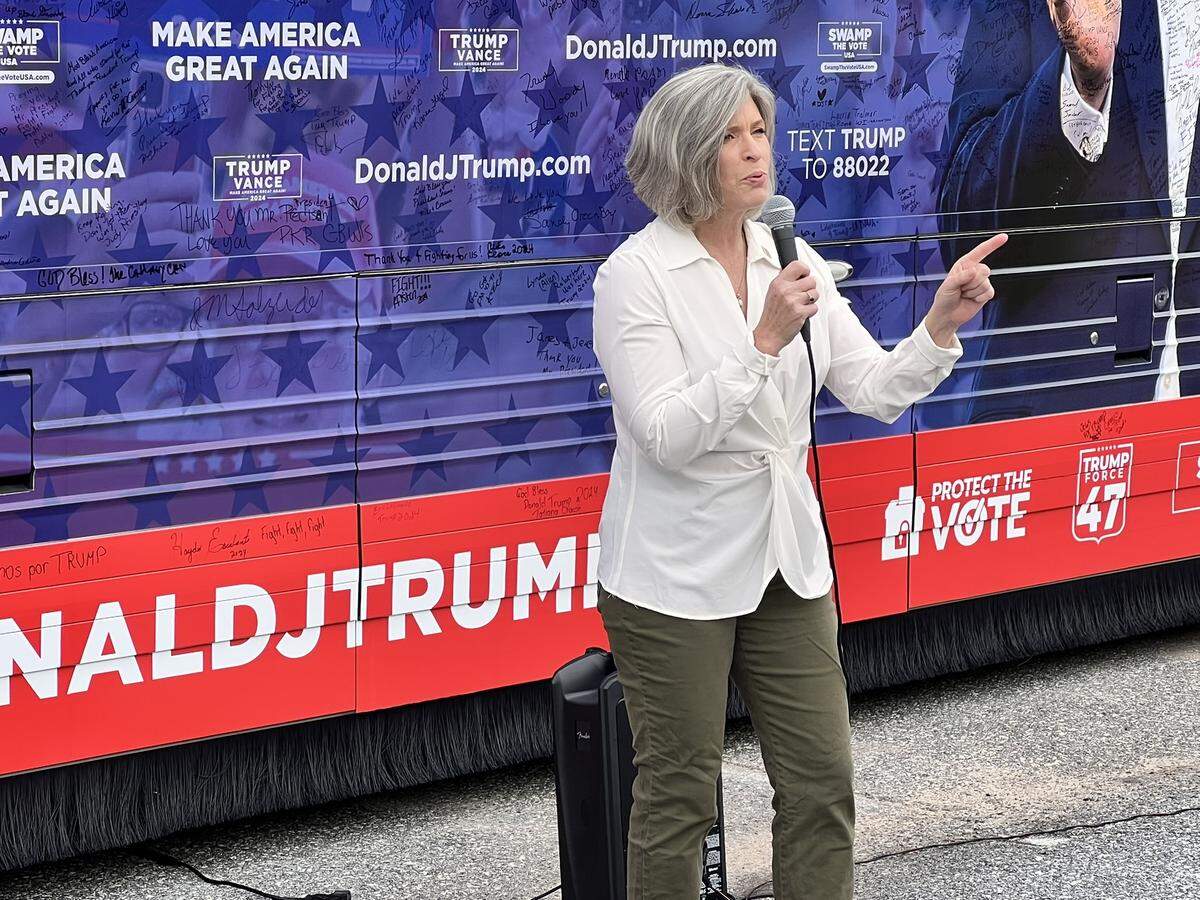 U.S. Sen. Joni Ernst speaks to supporters about immigration and economic policies during launch of the 3-day Team Trump Bus Tour in Columbus, GA on Oct. 4.