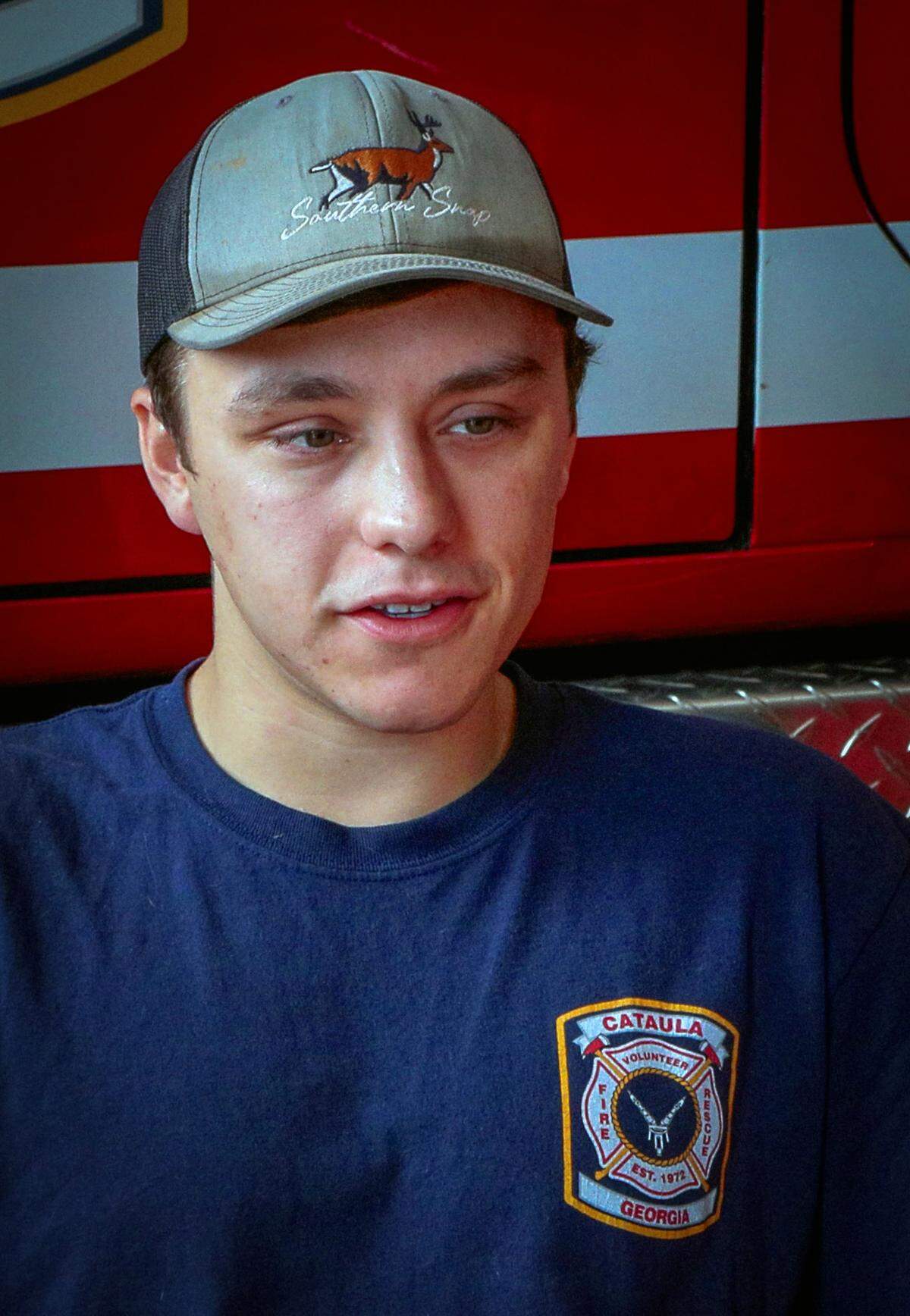 Hunter Price of Cataula Fire-Rescue in Harris County, talks May 7, 2026, about deploying to assist with the wildfire in Brantley County, Georgia.
