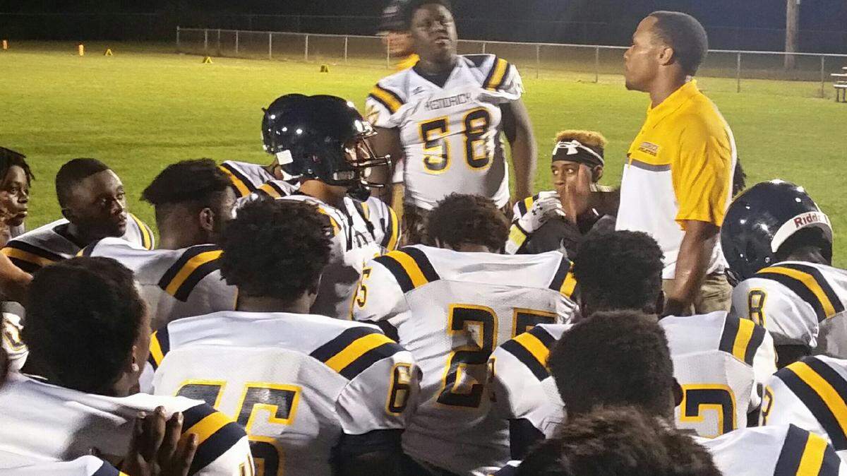 Photo submitted by Kendrick HighKendrick coach Cedric Ware talks to the Cherokess after Friday night's game at Stewart County. The Cherokees won 31-0.