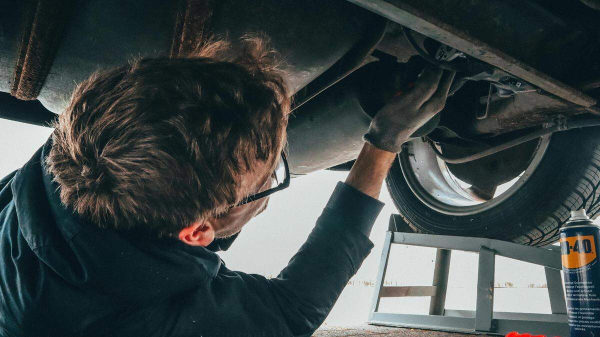 https://www.pexels.com/photo/man-fixing-vehicle-engine-2244746/