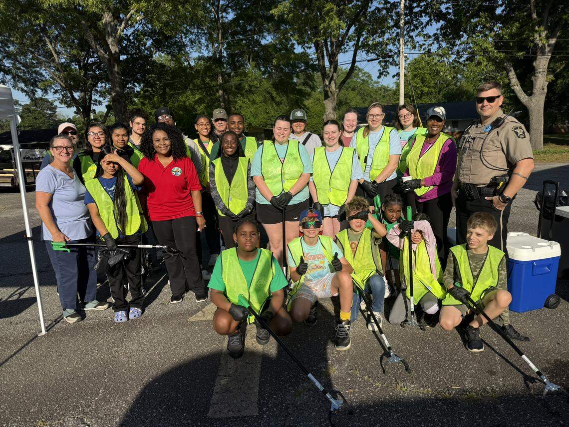 Some of the participants in the Keep Columbus Beautiful 2025 Earth Day events pose for a photo.