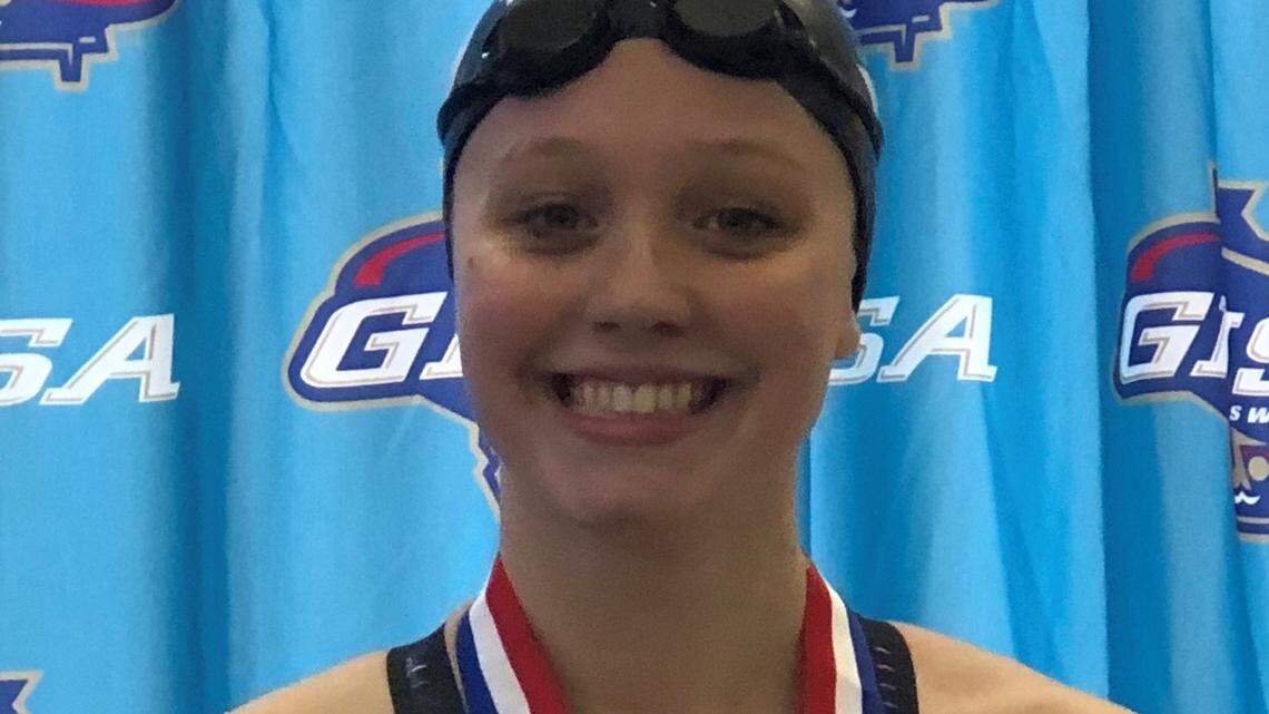 Columbus area swimmers win medals at state championships