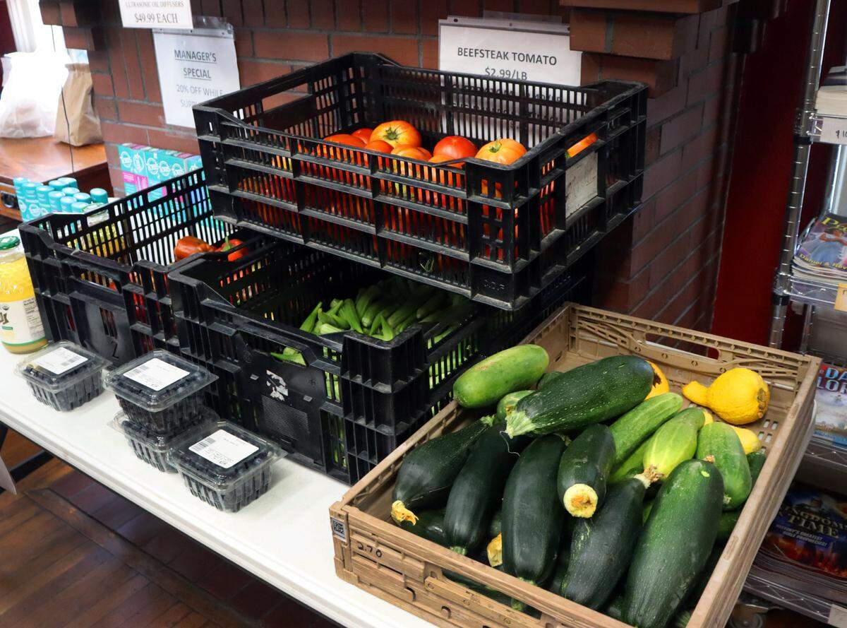 Vegetables from Uchee Pines Institute in Seale, Alabama at the Country Life store in Columbus. 7/15/24