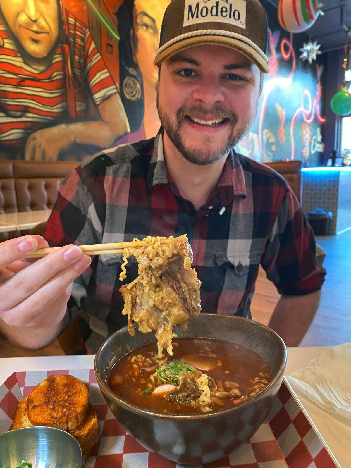 Ledger-Enquirer reporter Kelby Hutchison tried the Birria Ramen Soup at Me Encanta Modern Mexican Cuisine, 1231 Broadway, Suite 100, in downtown Columbus on Dec. 2, 2025.