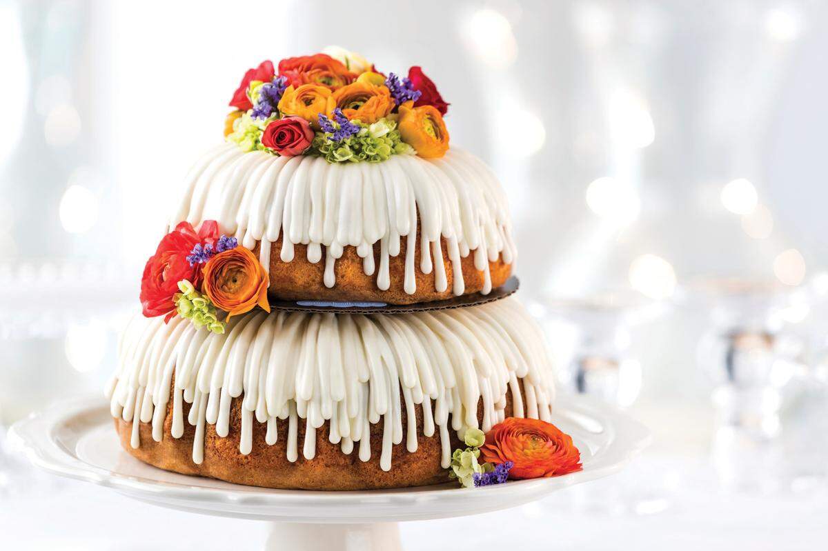 Franchisee Missy Moon is opening Nothing Bundt Cakes, a bakery specializing in bundt cakes, in late August in Columbus Park Crossing at 5555 Whittlesey in Columbus. The bakery will be located next door to Moe’s Southwest Grill in front of the AMC Classic theater. This is a tiered drizzle cake.
