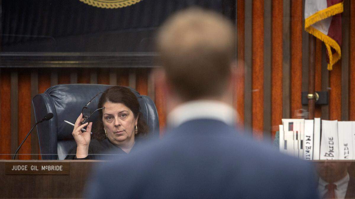 Judge Katherine Lumsden listens to attorney Christopher Breault during a pretrial motions hearing for suspended District Attorney Mark Jones, on Oct. 21, 2021 at the Government Center in Columbus, Ga.