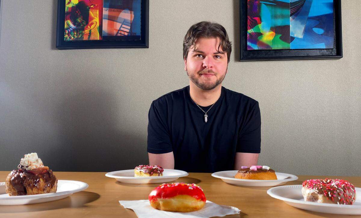 Ledger-Enquirer reporter Kelby Hutchison samples five special, Valentine’s Day donuts from different doughnut shops in Columbus, Georgia. 02/14/2024