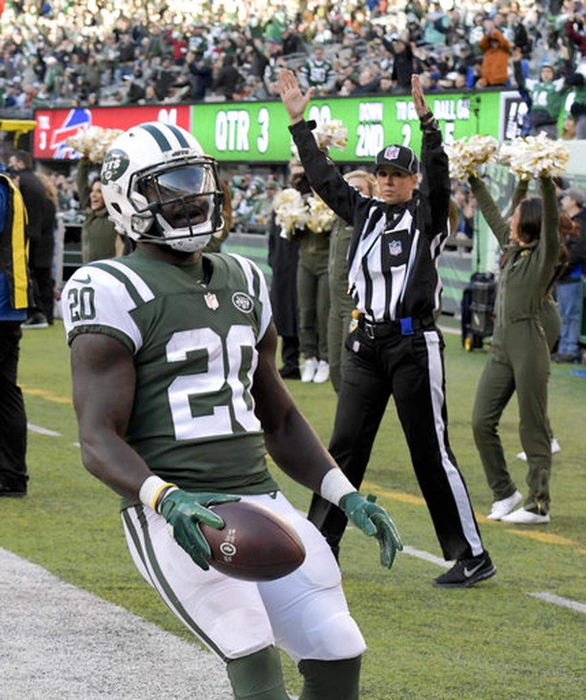 New York Jets running back Isaiah Crowell (20) celebrates after scoring a touchdown against the Buffalo Bills during the third quarter of an NFL football game, Sunday, Nov. 11, 2018, in East Rutherford, N.J.