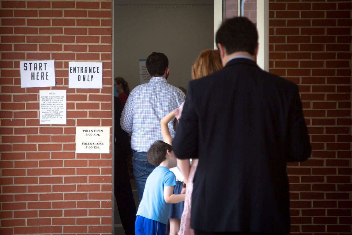 Residents line up to vote during the primary election Tuesday at St. Paul United Methodist in Columbus. For election results, visit ledger-enquirer.com.