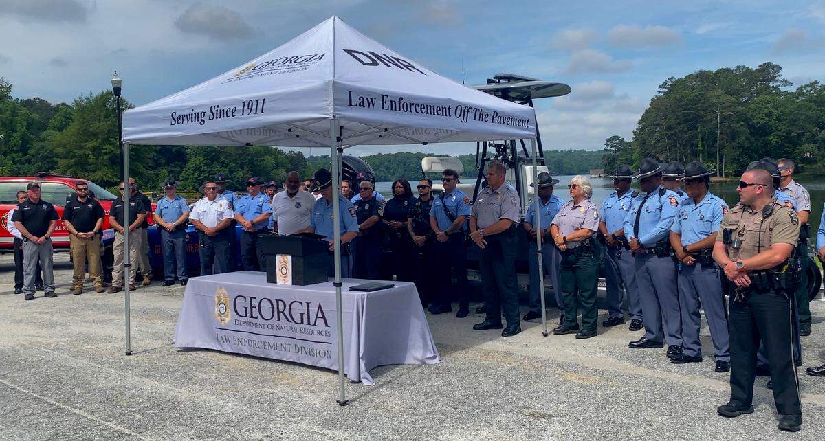 Col. Billy Hitchens, commissioner of the Georgia Department of Public Safety, speaks at the Belts & Jackets news conference May 21, 2026, at Lake Oliver Marina in Columbus.