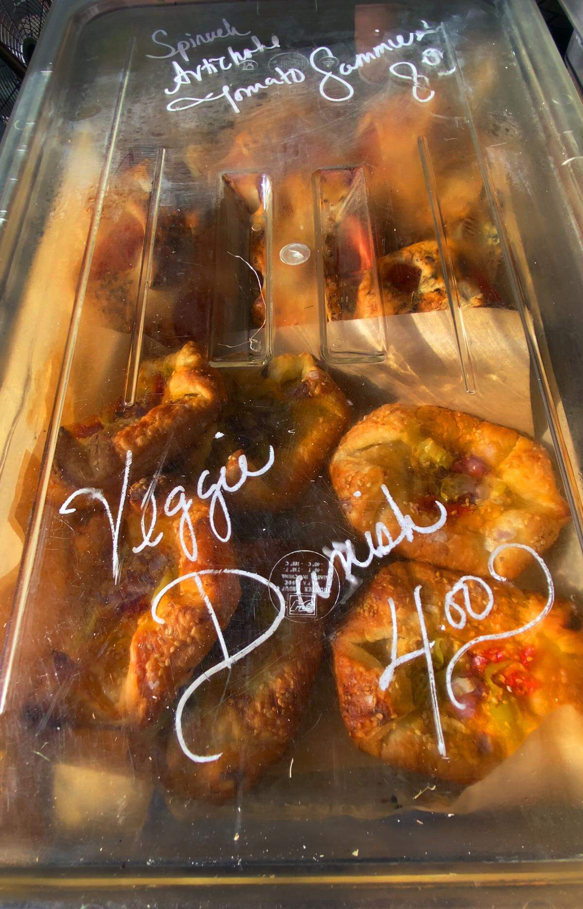 Kate Williams, chef and owner of The Old School Kitchen, sells a variety of baked goods at Market Days on Broadway in Columbus, including veggie danishes. 05/24/2025