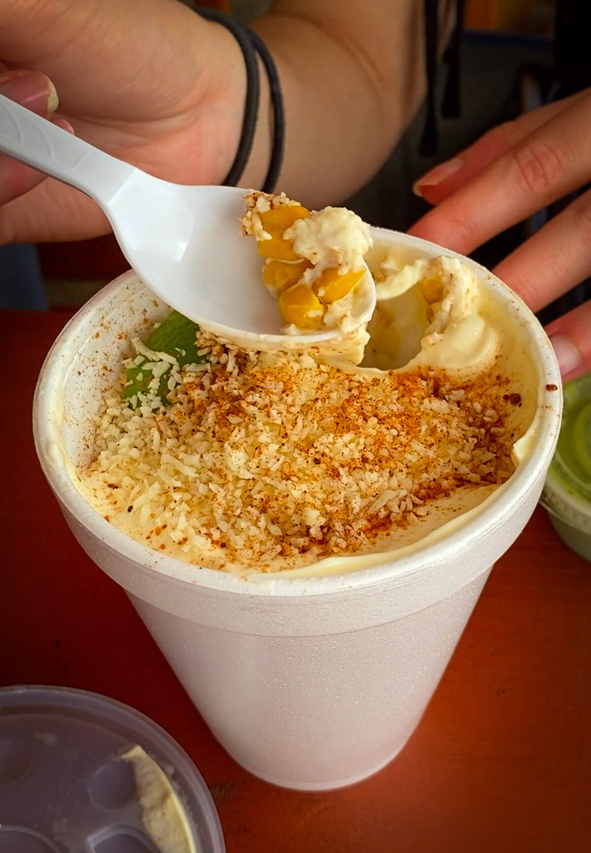 Among the items Ledger-Enquirer intern Madeline Shapiro had for lunch at Snacks Chabelita was esquites, corn mixed with creamy mayonnaise, cotija cheese, lime juice and chili powder, served in a cup for $4.99.