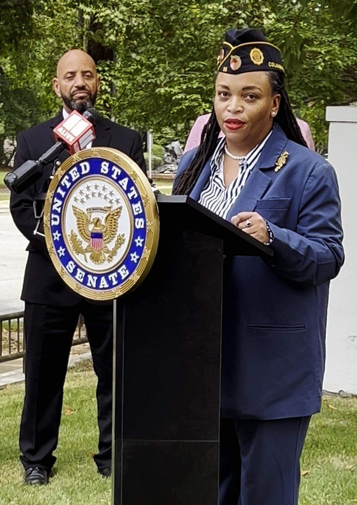Military veteran LaKesha Stringer speaks during a news conference hosted by U.S. Sen. Jon Ossoff, D-Georgia, on Aug. 20, 2025, outside Heritage Tower in Columbus to announce President Donald Trump signed into law bipartisan legislation that Ossoff championed to help veterans experiencing financial hardship avoid foreclosure.