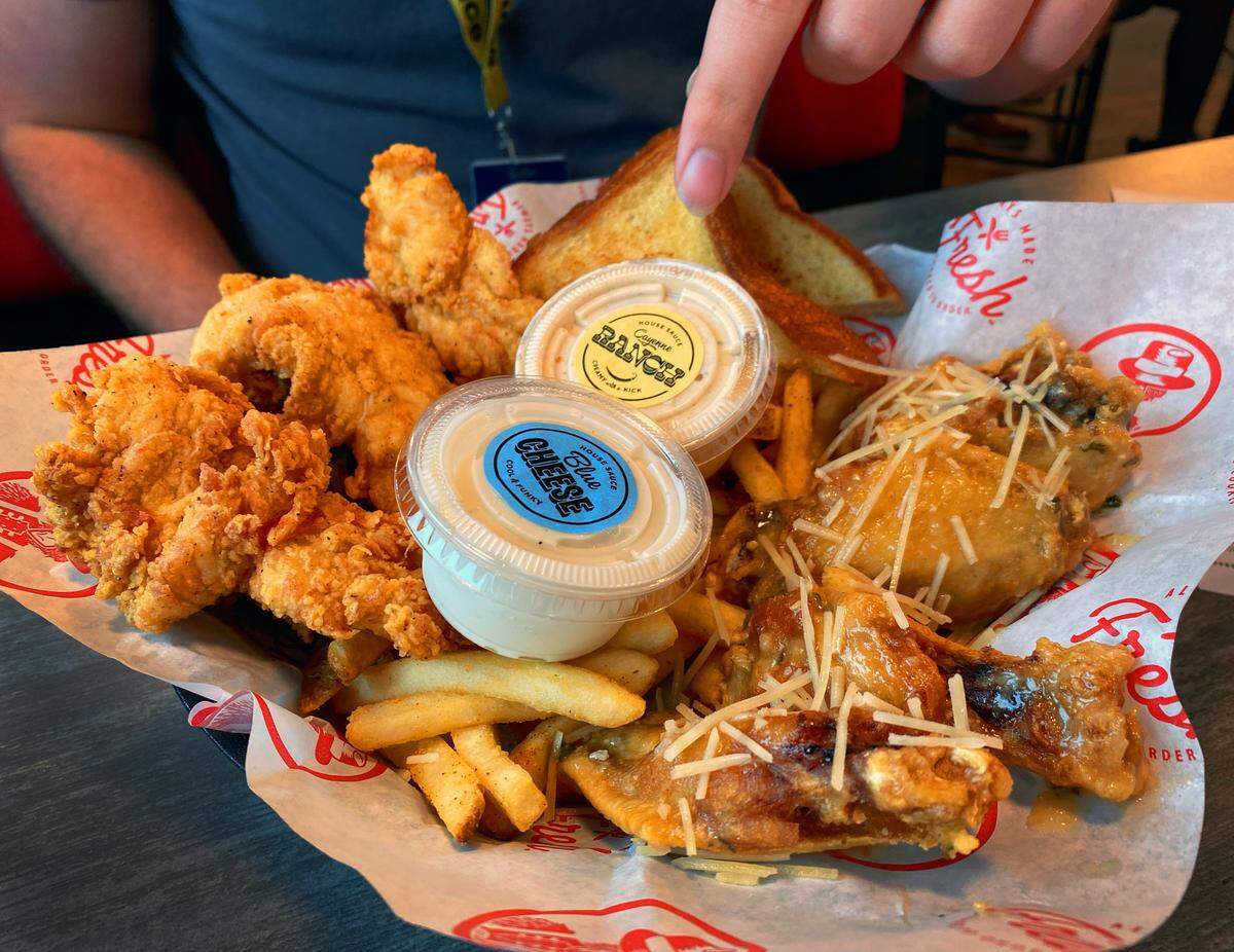 Ledger-Enquirer reporter Kelby Hutchison tried the chicken tenders and the chicken wings when the Columbus area’s first Slim Chickens, at 2041 US-280 in Phenix City, opened to the public Aug. 4, 2025.