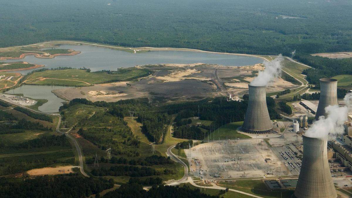 Georgia Power’s Plant Scherer, right, and its Ash Pond 1, upper left, in September of 2023.