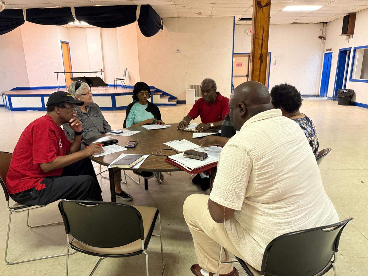 Community leaders and activists have created the Historic Liberty District Foundation, also known as Liberty District Inc. Pictured fourth from left is executive director Richard Jessie meeting May 12, 2025, with foundation members at Prince Masonic Temple, 815 Sixth Ave., in Columbus.