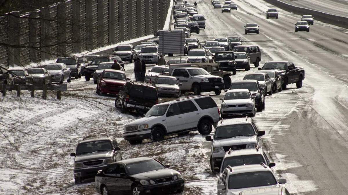 Cars abandoned on an Atlanta-area highway after a winter storm