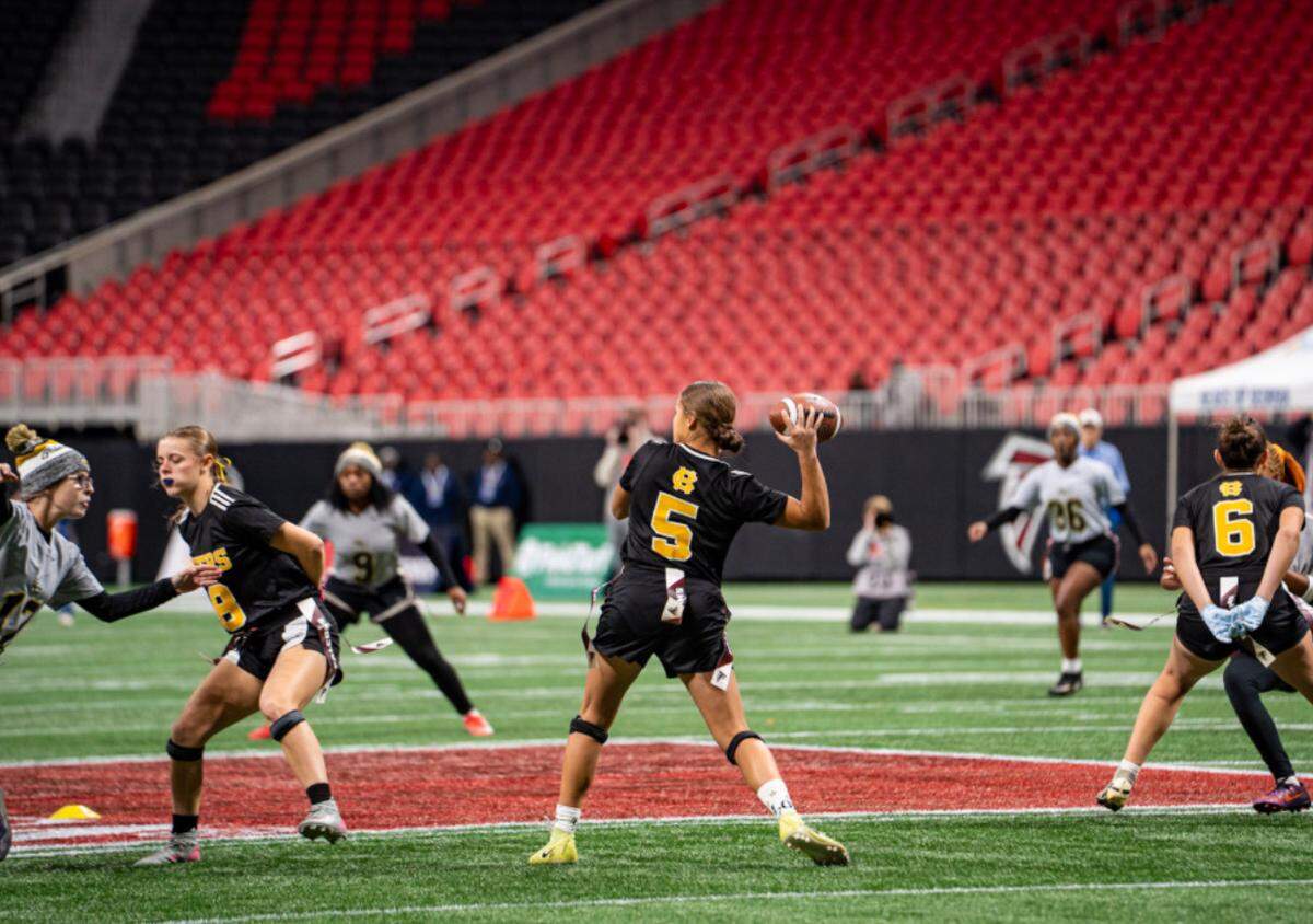 Harris County senior quarterback Madalynn “Cricket” Cauley prepares to pass during the Georgia High School Association Division 1 flag football state championship game Dec. 15, 2015, at Mercedes-Benz Stadium in Atlanta. The Tigers beat Washington County 32-0 to win the title.