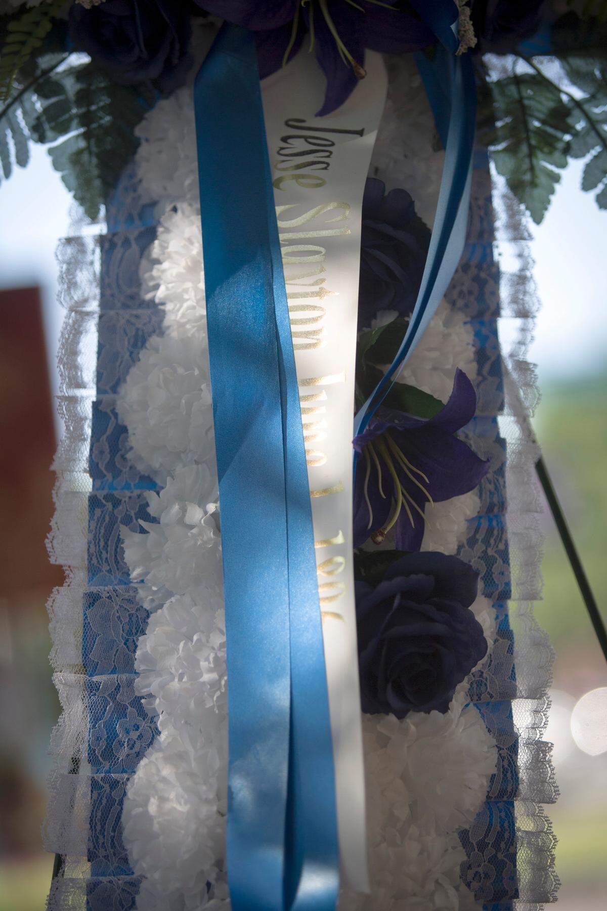 A memorial is placed for Jesse Slayton on June 17, 2021, on Broadway and 11th Ave in Columbus, Ga. In 1896, Miles was lynched by a white mob at the intersection.