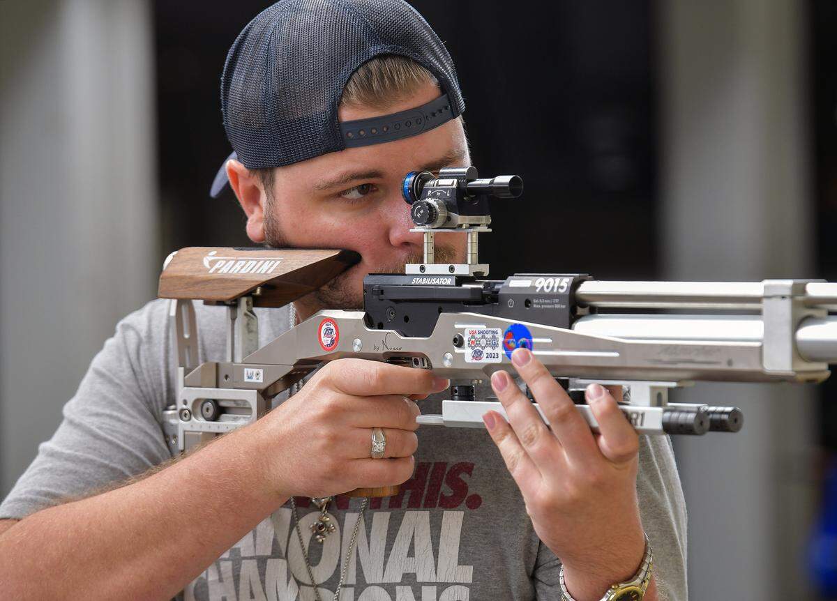 Ledger-Enquirer reporter Kelby Hutchison shoots an air rifle at Ft. Moore. 07/02/2024