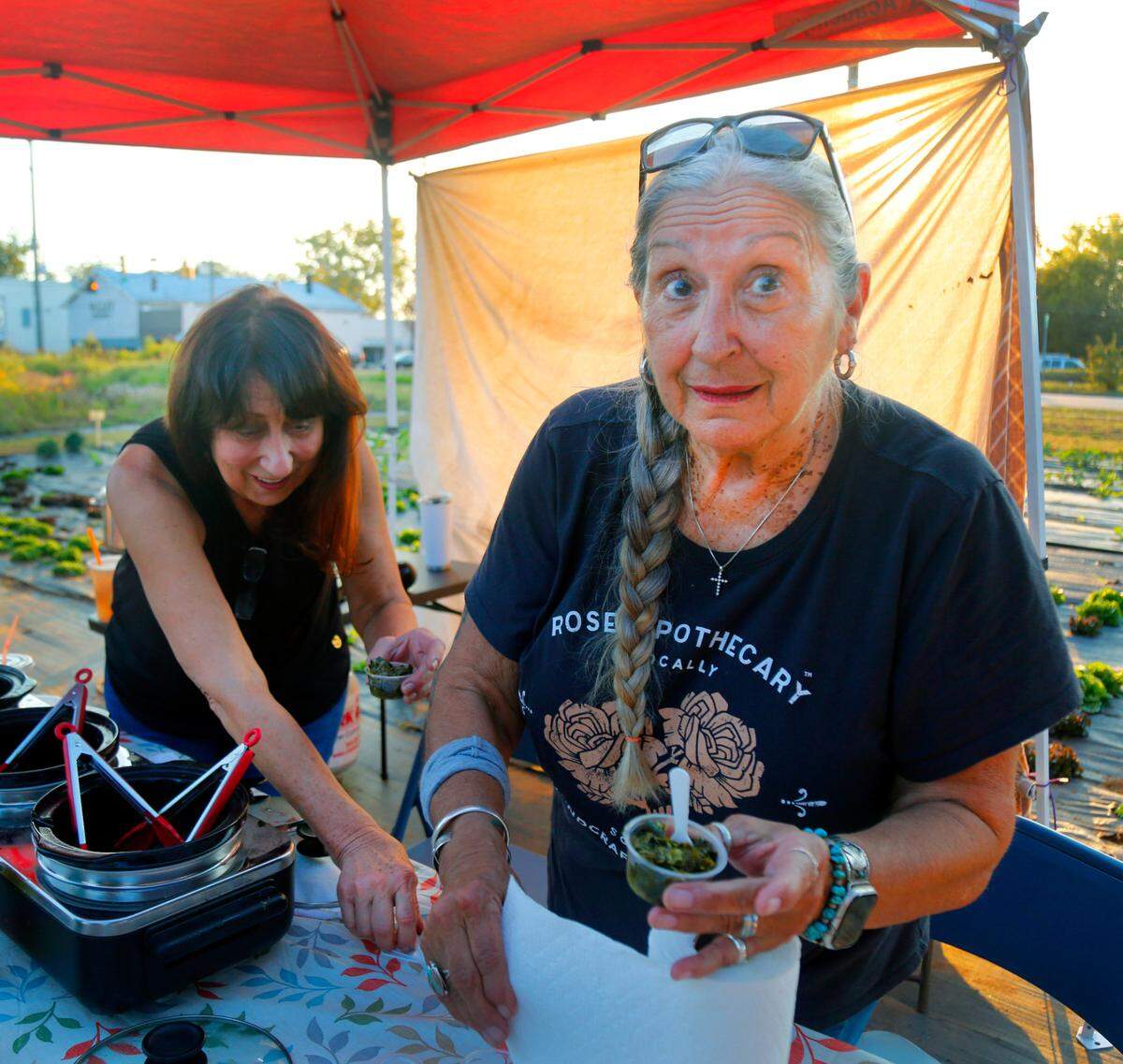 Olivia Lowery, right,won the Farmer’s Choice Award at MercyMed Farm’s second annual Collards Cook-Off. The event also included live music, food, vendors, fresh farm veggies, and pumpkin decorating for kids. 10/25/2024