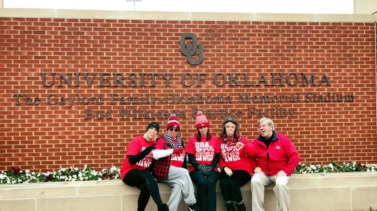 The group poses in Georgia gear outside the University of Oklahoma