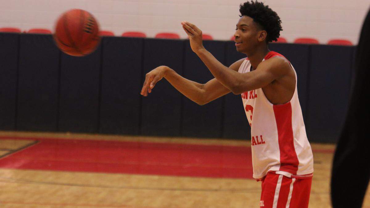 Guard Tre Todd passes the ball during practice Monday. Central is currently ranked No. 1 for the first time since 2002.