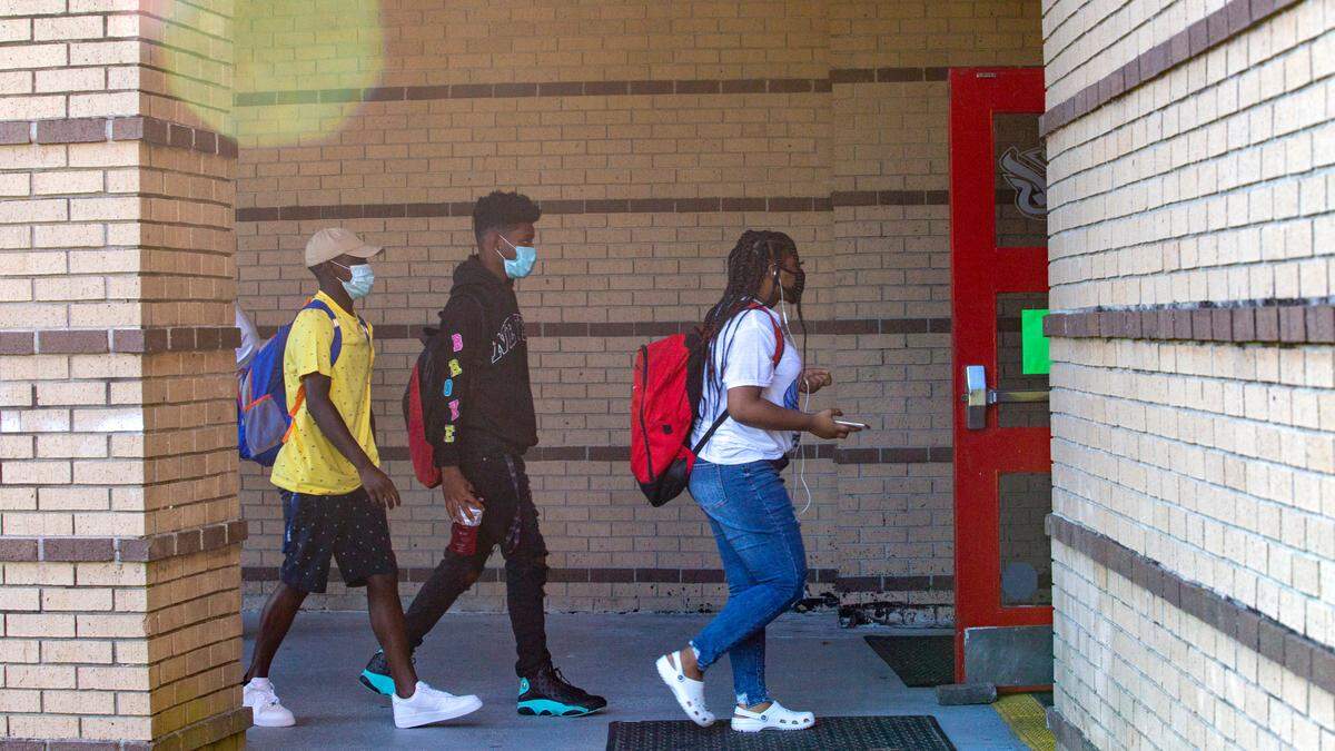 Students attend their first day of school at Central High school on Tuesday, August 18, 2020 in Phenix City, Ala.
