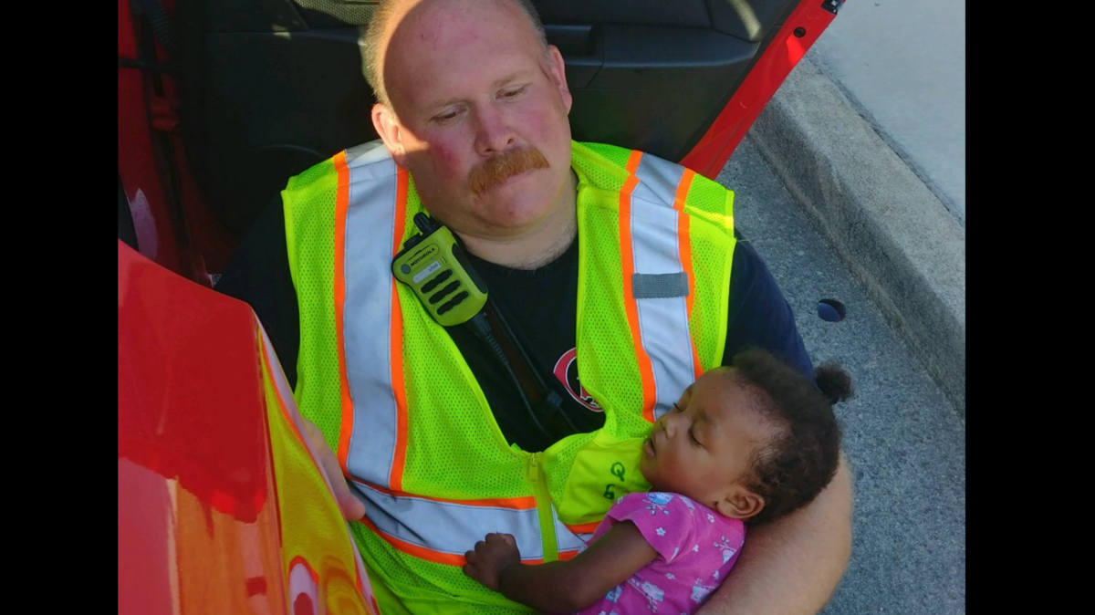 A photo of a Chattanooga, Tennessee fire Captain Chris Blazek comforting a baby after car crash went viral and is highlighting the many roles firefighters play in their daily work. Blazek said the photo shows why he still does the job.