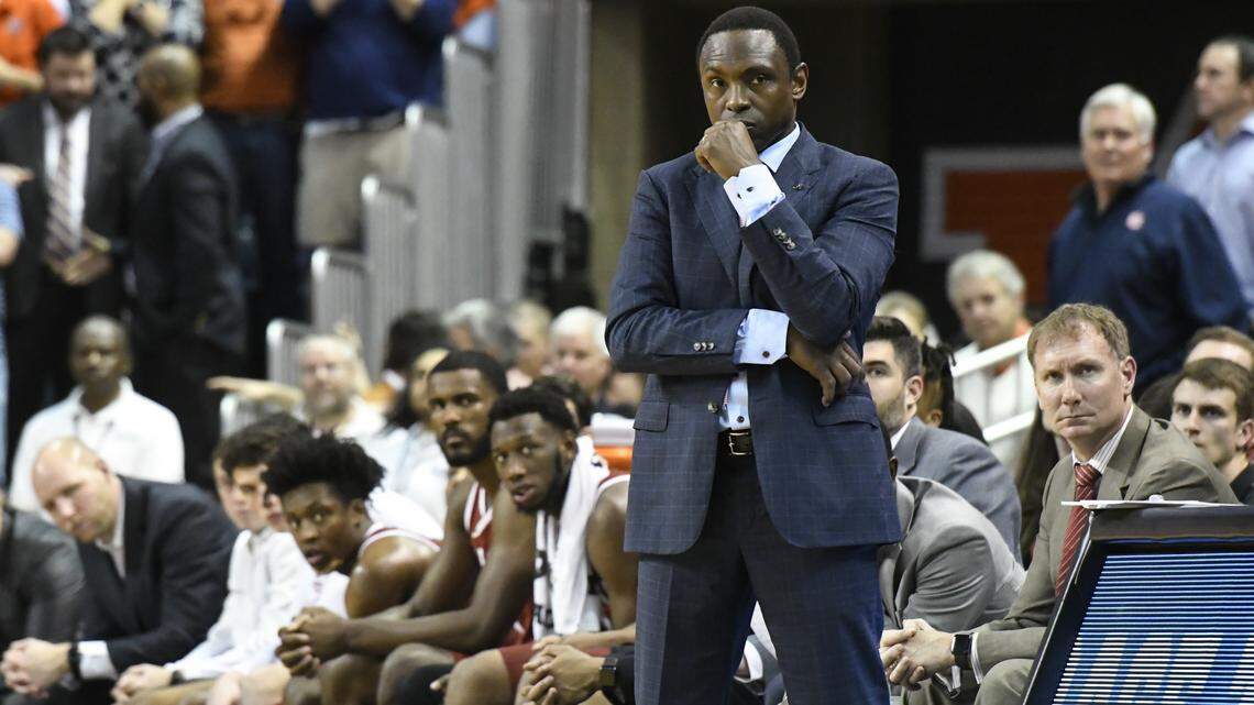 Alabama coach Avery Johnson and players watch the final moments of the team's NCAA college basketball game against Alabama on Wednesday, Feb. 21, 2018. Johnson's Crimson Tide is one of several teams on the bubble of making the NCAA Tournament.