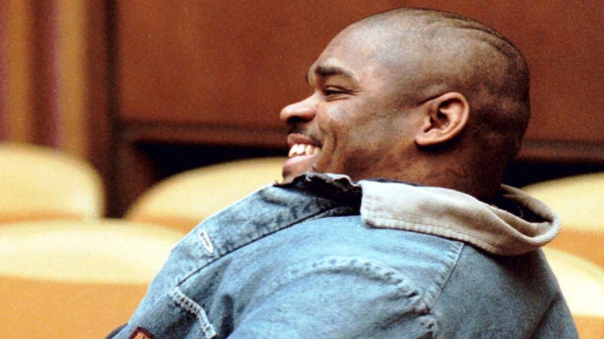 Leon Tollette grins during his jury trial to determine whether he would get the death penalty.