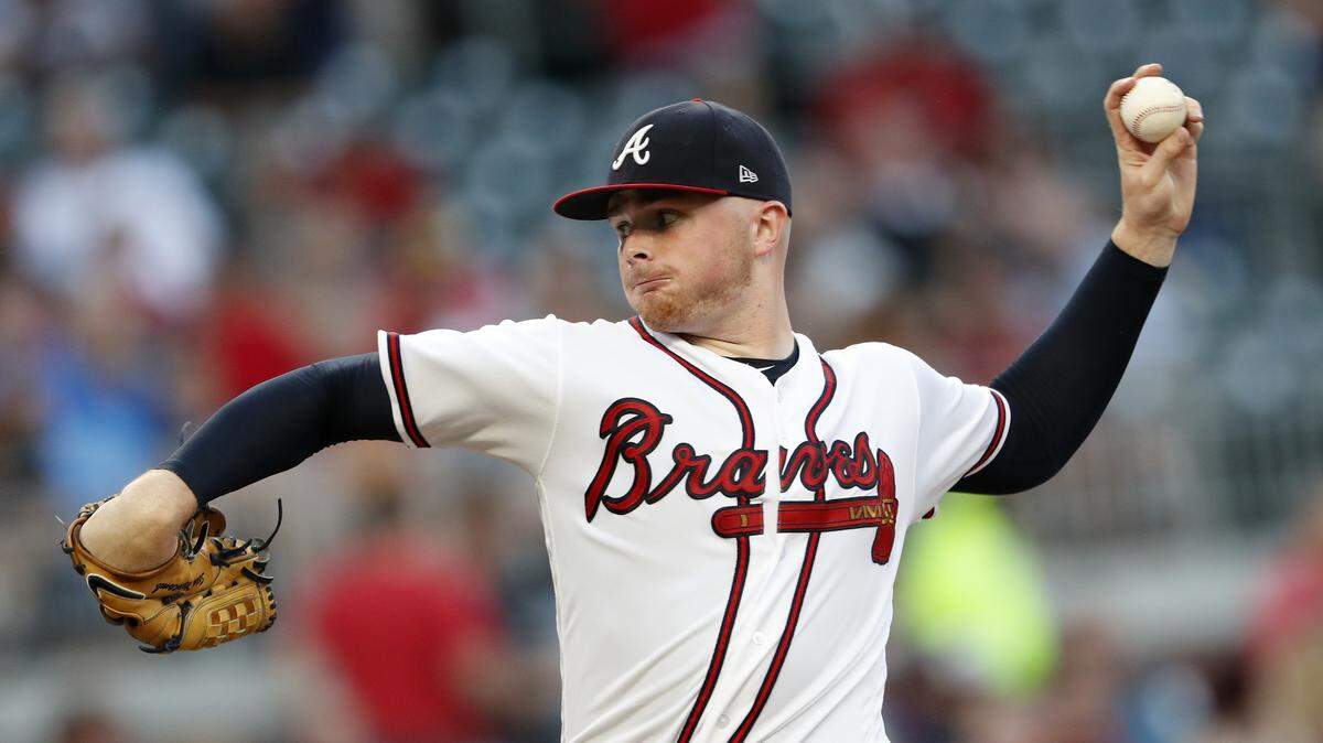 Atlanta Braves starting pitcher Sean Newcomb (15) pitches in the second inning of a game against the Washington Nationals on Thursday in Atlanta.