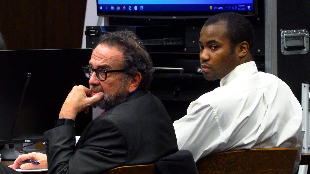 Jayvon Hatchett, right, sits with his public defender, Steve Craft. 03/21/2023
