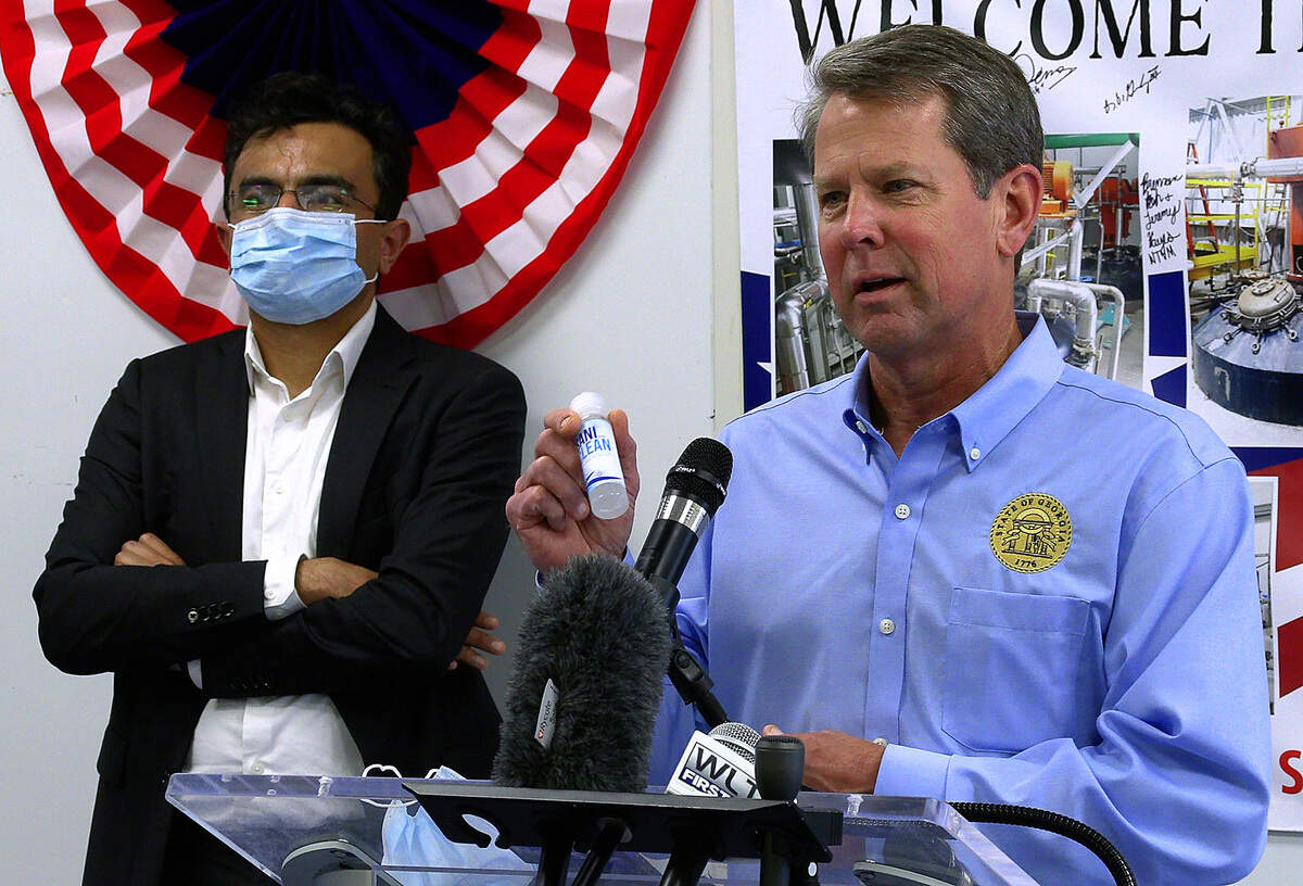 Georgia Gov. Brian Kemp,right, visited High Performance Product Engineering in Columbus, Georgia Wednesday afternoon. Kemp first toured the facility before making remarks and answering questions from the media.