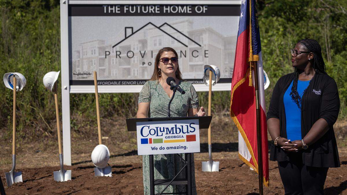 Laura Johnson, CEO of the Housing Authority of Columbus, speaks during the groundbreaking ceremony June 4, 2026, for Providence Pointe, a new 102-unit affordable housing development for seniors ages 55 and older. The ceremony was on Brownie Lane in the Elliott’s Walk community. Elliott’s Walk is off Victory Drive in Columbus.