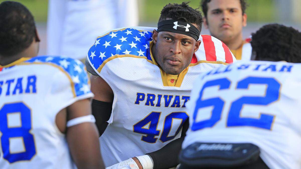 Chamgnat Catholic's defensive lineman Kayude Oladele (40) during Public School vs. Private School South Florida All-Star football game at Ansin Sports Complex in Miramar on Saturday, January 13, 2018.